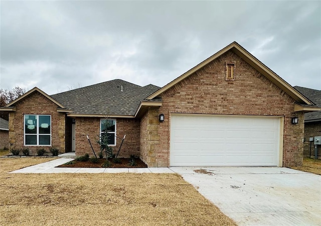 view of front of home with a garage