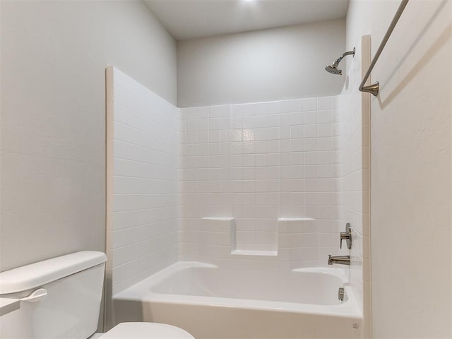 bathroom with toilet and shower / washtub combination