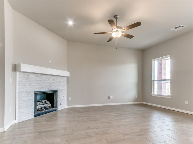 unfurnished living room featuring ceiling fan