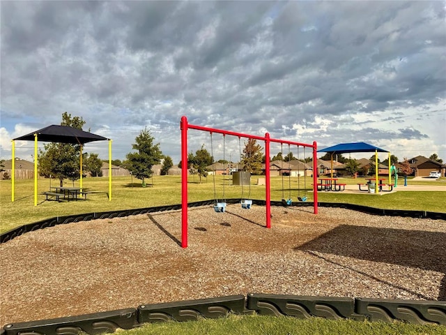 view of jungle gym with a lawn