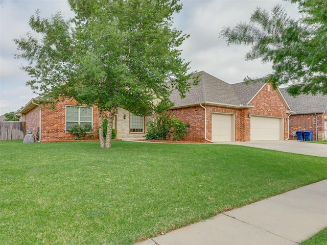 ranch-style home featuring a front lawn and a garage