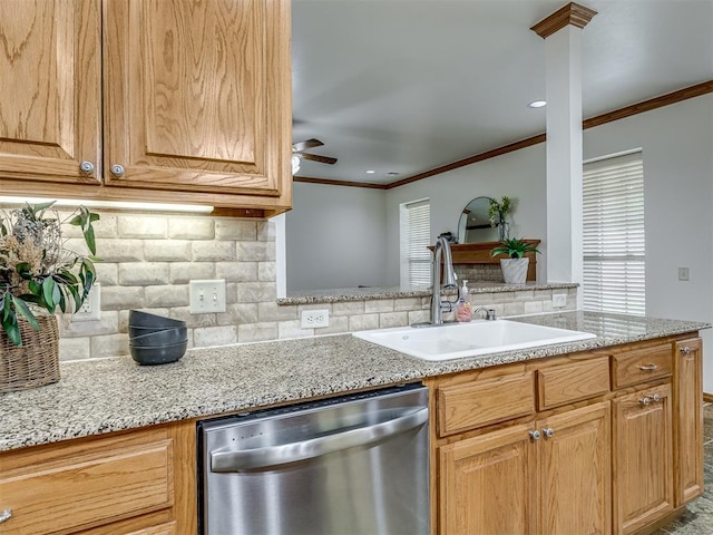 kitchen featuring decorative backsplash, stainless steel dishwasher, ceiling fan, crown molding, and sink