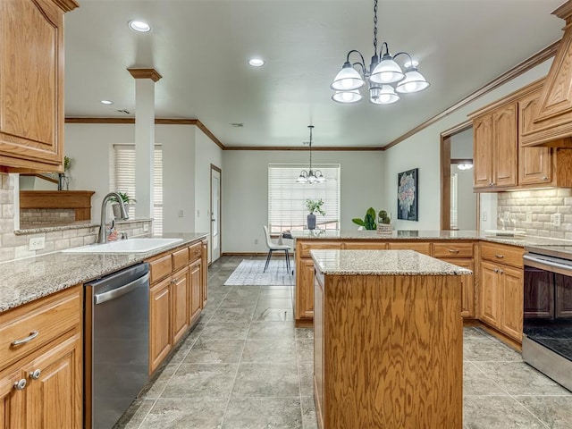 kitchen with appliances with stainless steel finishes, backsplash, hanging light fixtures, and a notable chandelier