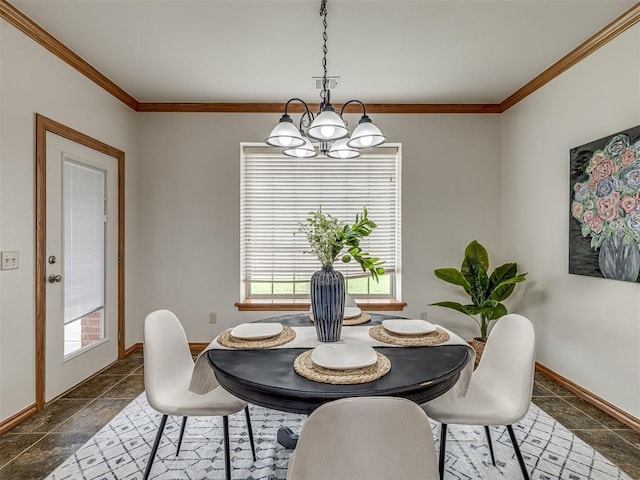 dining space featuring ornamental molding and a chandelier