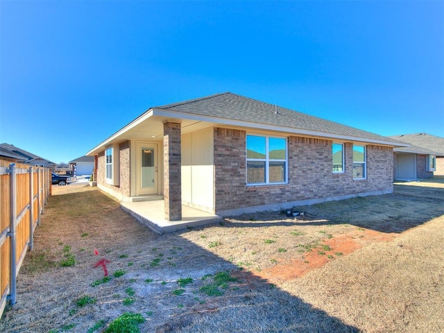 back of property with a patio area