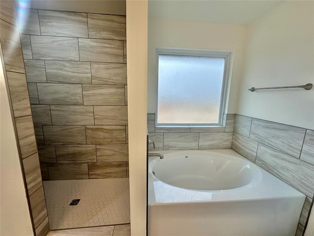 bathroom with plus walk in shower