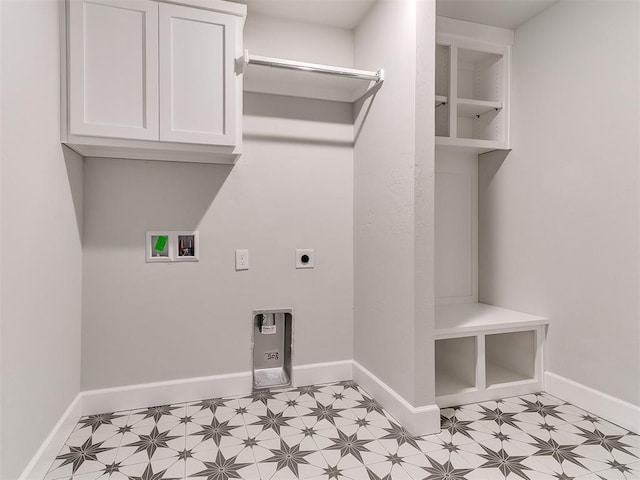 laundry area with washer hookup, cabinets, and hookup for an electric dryer