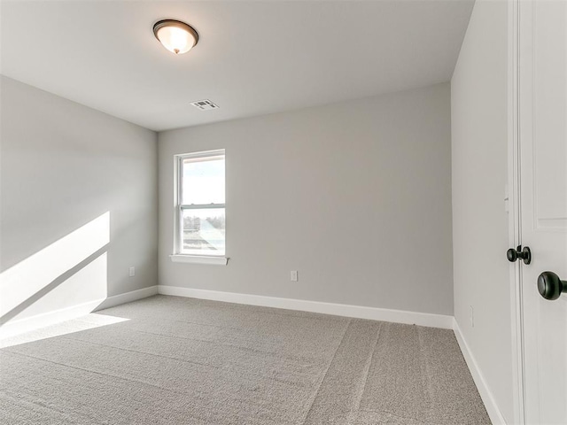 empty room featuring carpet floors