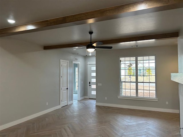 spare room with light parquet floors and ceiling fan