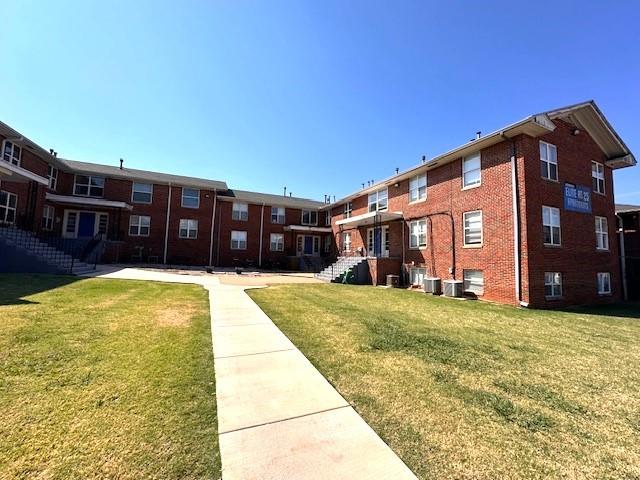 view of property with central AC unit