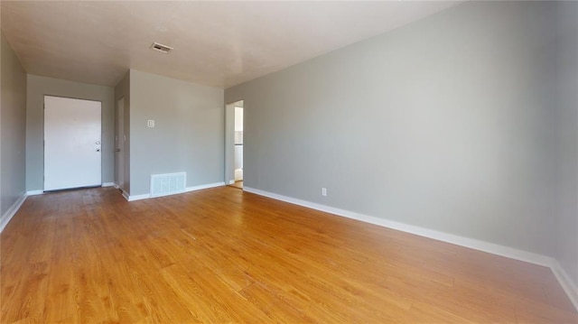 empty room featuring light wood-type flooring