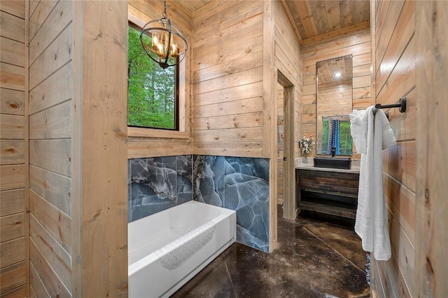 bathroom featuring a washtub, wooden ceiling, an inviting chandelier, and wooden walls