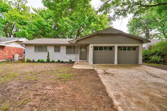 ranch-style home with a garage