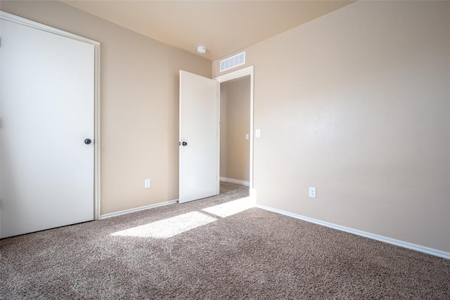 unfurnished bedroom with carpet flooring