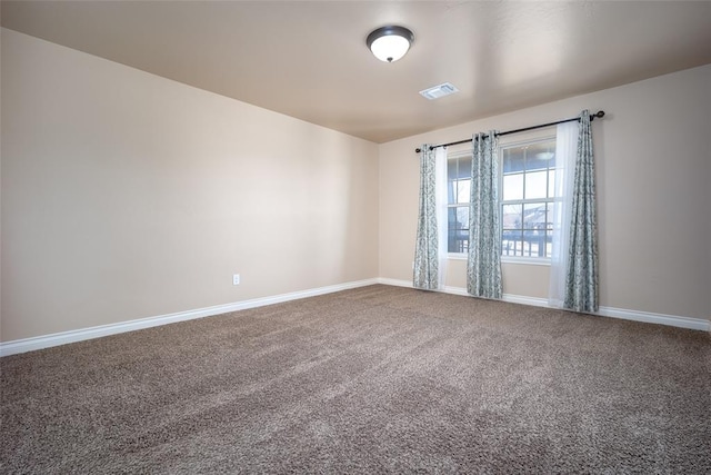 spare room with carpet floors