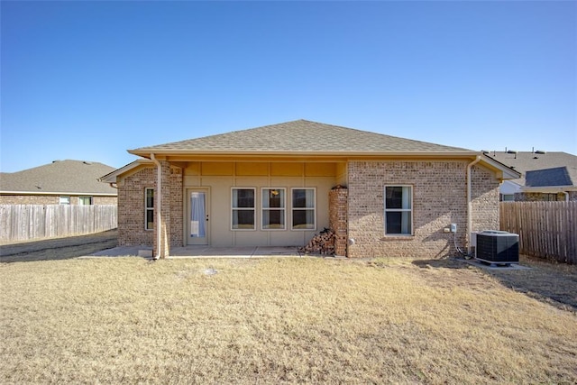 back of house featuring a patio area and central AC unit