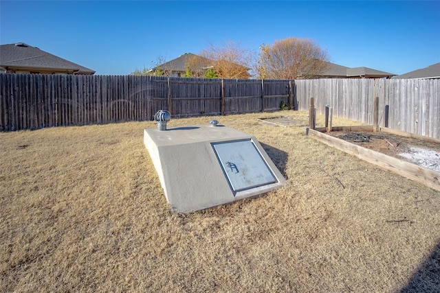 entry to storm shelter with a lawn