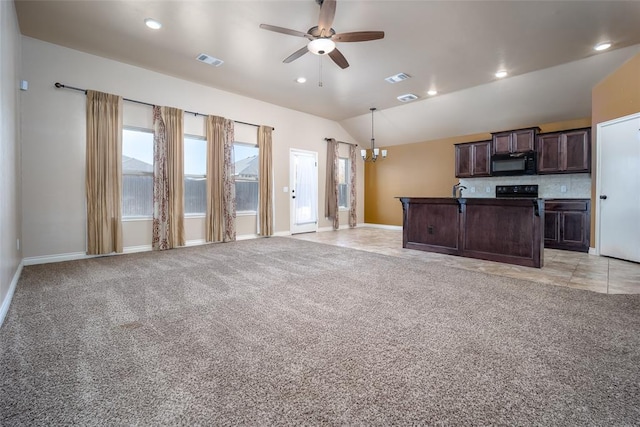 unfurnished living room with light carpet, ceiling fan with notable chandelier, and vaulted ceiling