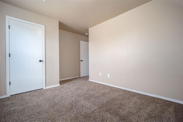 unfurnished room with carpet