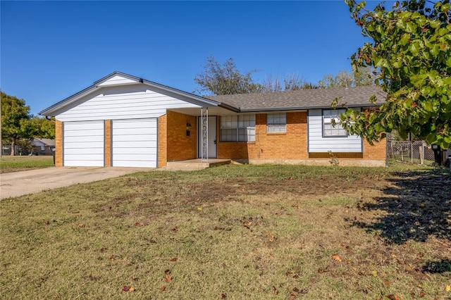 ranch-style home with a front yard and a garage