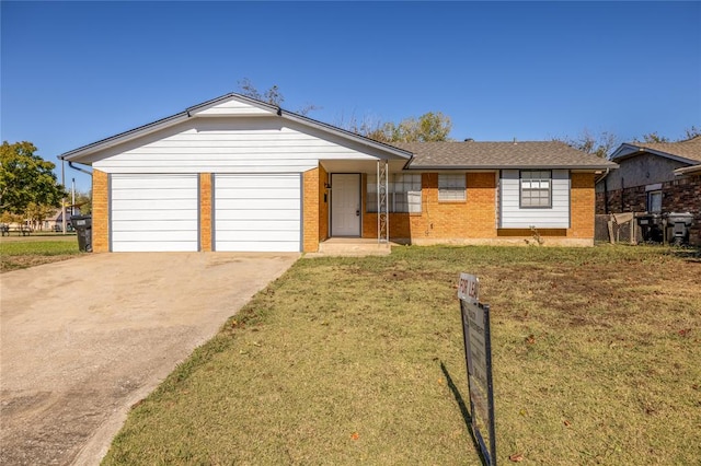 ranch-style home with a front yard and a garage