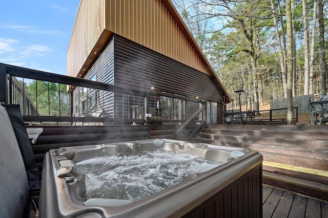 deck featuring a hot tub