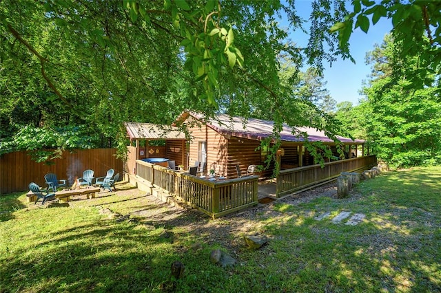 view of yard with a fire pit