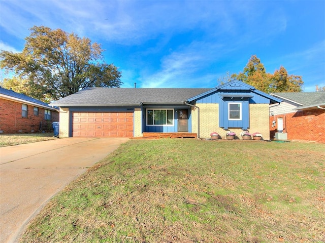 ranch-style house with a front yard and a garage