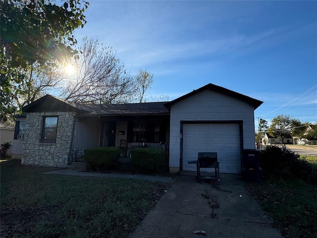 single story home featuring a garage