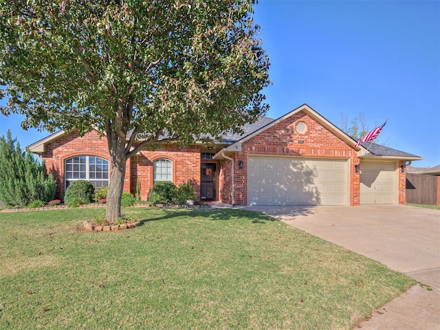 single story home with a front lawn and a garage