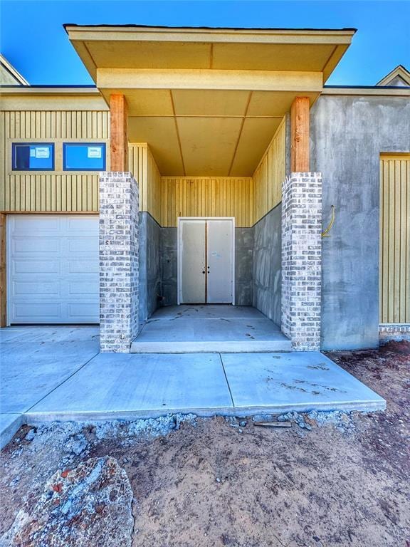 entrance to property with a garage