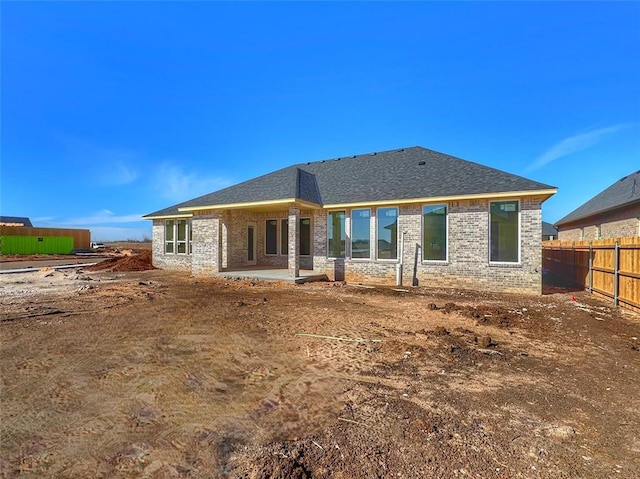 rear view of house with a patio area