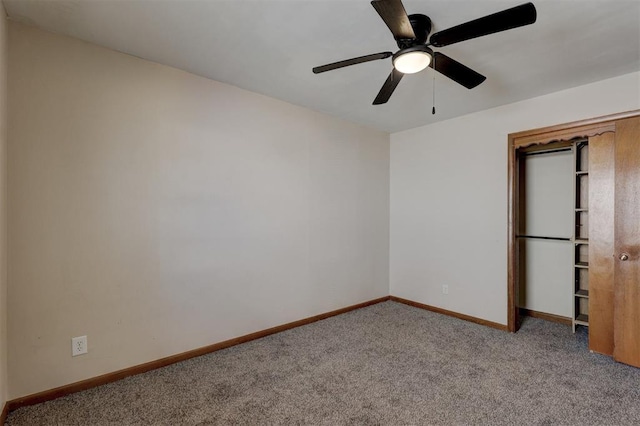 unfurnished room featuring light colored carpet and ceiling fan