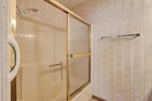 bathroom featuring enclosed tub / shower combo