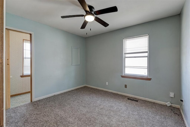 carpeted empty room with ceiling fan