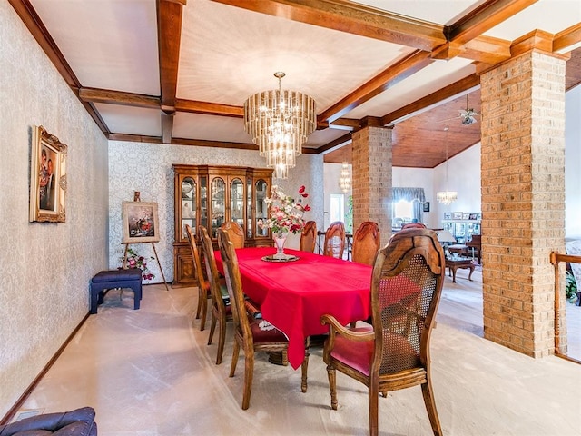 dining area with beamed ceiling, ceiling fan with notable chandelier, ornate columns, and carpet