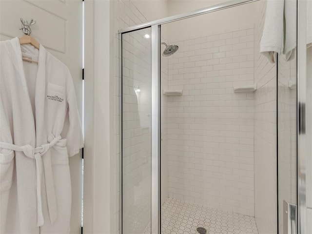 bathroom featuring an enclosed shower