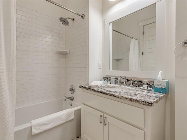 bathroom featuring vanity and shower / bath combo with shower curtain