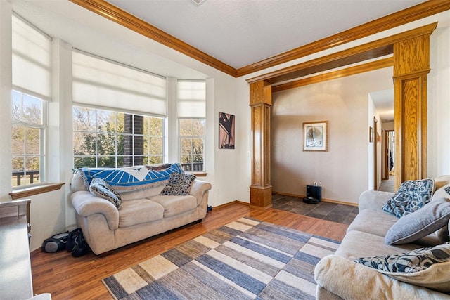 living room featuring dark hardwood / wood-style flooring and ornamental molding