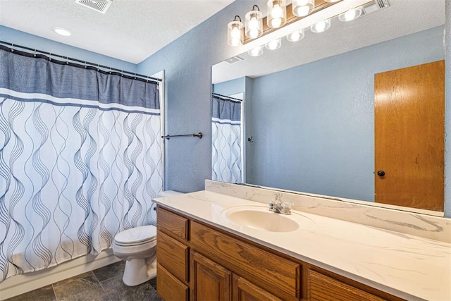 full bathroom featuring vanity, toilet, a textured ceiling, and shower / tub combo with curtain