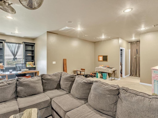 living room featuring light colored carpet