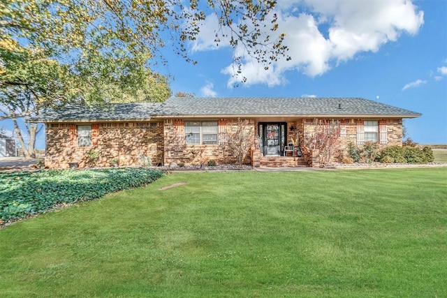 ranch-style house with a front yard