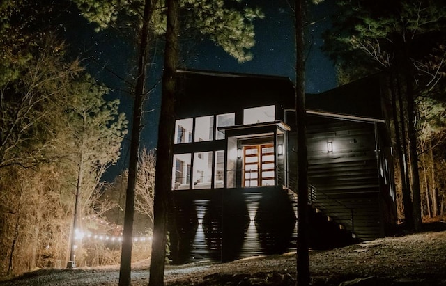 view of side of property featuring french doors