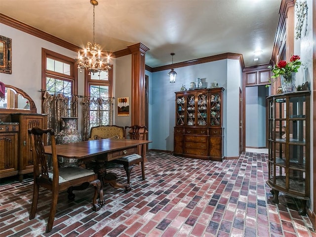 dining area with a chandelier and ornamental molding