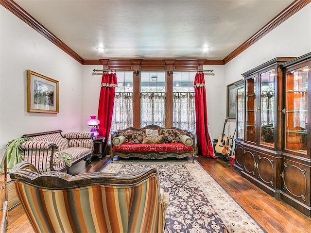 interior space featuring crown molding and wood-type flooring