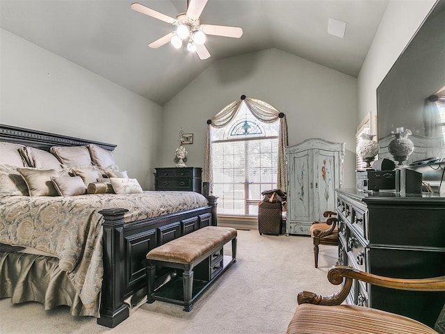 bedroom featuring ceiling fan, light colored carpet, and vaulted ceiling