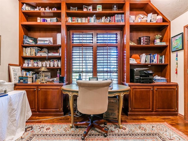 office space with light hardwood / wood-style flooring