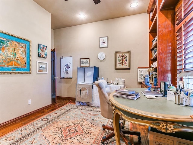 office area with hardwood / wood-style flooring and ceiling fan