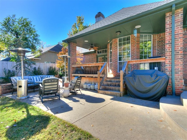 view of patio featuring an outdoor living space and ceiling fan