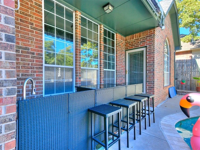 view of patio featuring a bar